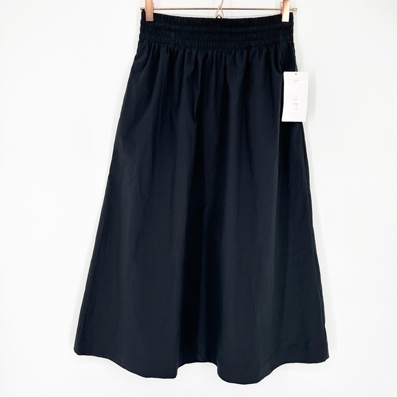 NWT Athleta Midday Mid Rise Midi Poplin Skirt Small Black Pockets Elastic Waist - Picture 2 of 8